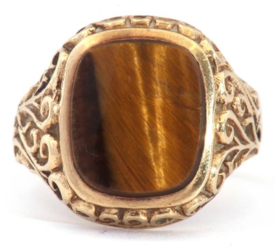 Lot 29 - 9ct gold cushion cut tiger's eye ring, 14 x...