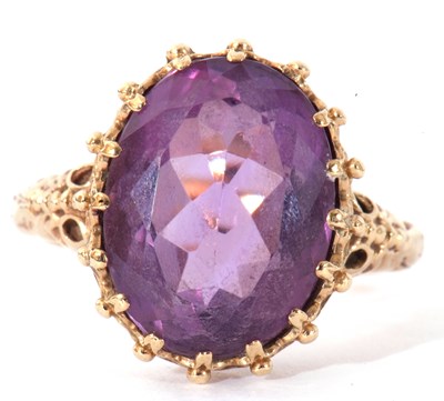 Lot 64 - Large amethyst dress ring, the oval faceted...