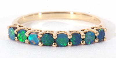 Lot 69 - Modern 9ct gold opal doublet 8-stone ring,...