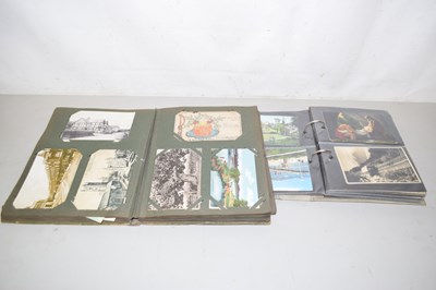 Lot 38 - Two albums of postcards