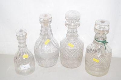 Lot 42 - A group of four 19th Century clear glass...