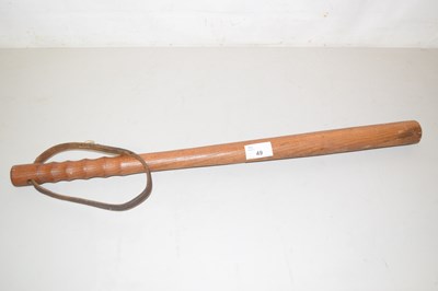 Lot 49 - A turned wooden truncheon