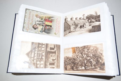 Lot 51 - An album of assorted postcards
