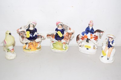 Lot 52 - A group of five various Staffordshire figures