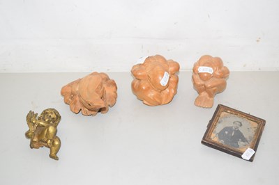 Lot 70 - A group of three various carved hardwood...