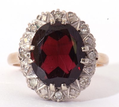 Lot 75 - Modern 9ct gold garnet and diamond ring, the...
