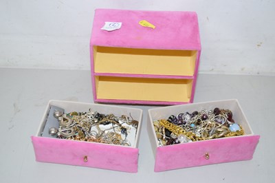 Lot 99 - A small two drawer jewellery cabinet and contents