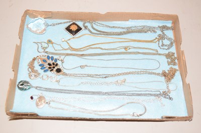 Lot 100 - Box of pendants and chains