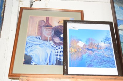 Lot 209 - Photographic print of a winter scene together...