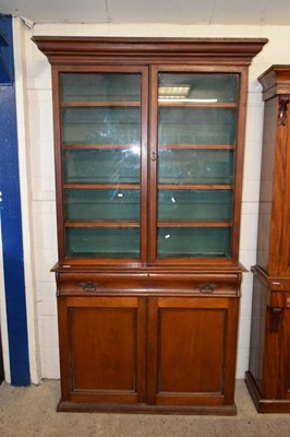 Lot 219 - A late Victorian mahogany bookcase cabinet...