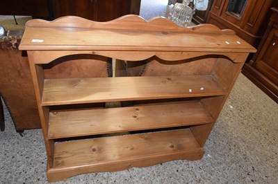 Lot 241 - A modern pine bookcase cabinet