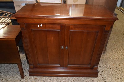 Lot 261 - A dark wood television cabinet