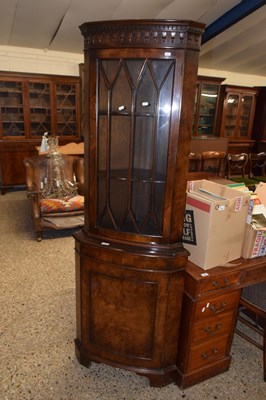 Lot 262 - A burr wood veneered corner display cabinet