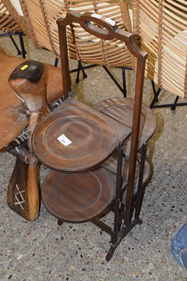 Lot 283 - A vintage folding four tier cake stand