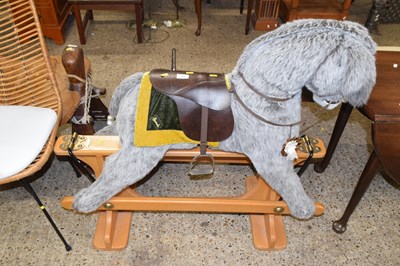 Lot 290 - A Merrythought rocking donkey, retailed by...