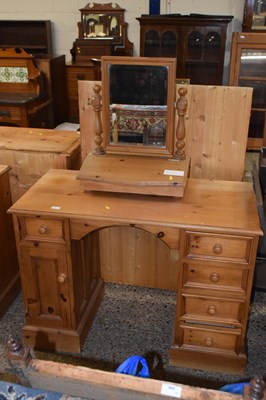 Lot 303 - A pine twin pedestal dressing table with mirror
