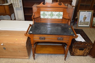 Lot 320 - Late Victorian walnut framed tile back wash stand