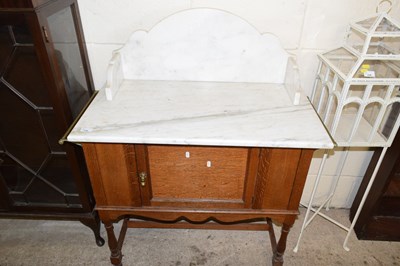 Lot 336 - Late Victorian marble topped  oak wash stand