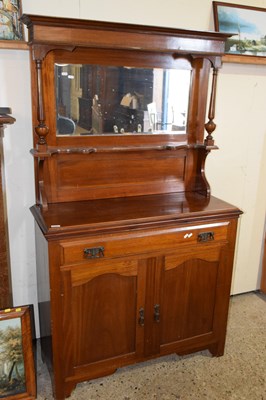 Lot 345 - A late Victorian American walnut mirror backed...