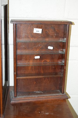 Lot 225 - A small glazed dark wood table top display...