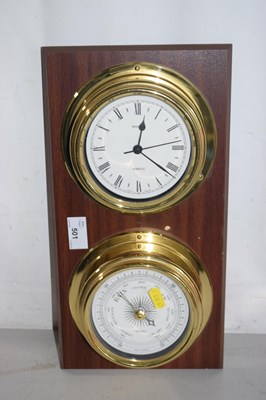 Lot 501 - A modern ships barometer and clock