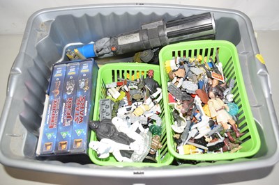 Lot 504 - A box of Star Wars videos, various figures,...