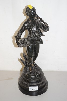 Lot 528 - A hollow bronzed Spelter model of a farm labourer