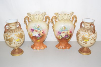 Lot 533 - A pair of bulbous opaque glass vases with gilt...