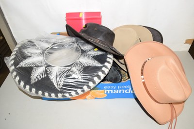 Lot 584 - A box of various hats, ladies shoes etc