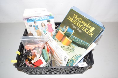 Lot 587 - A box of various dress making patterns, sewing...