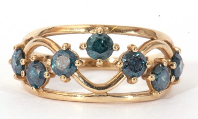 Lot 113 - Modern 9ct gold and blue stone ring, the open...