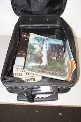 Lot 613 - A suitcase of assorted books