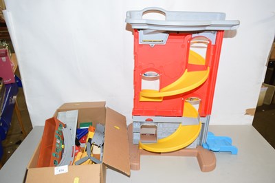 Lot 614 - A child's Little Tikes car ramp together with...