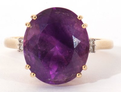 Lot 116 - Modern 18ct gold, amethyst and diamond ring,...
