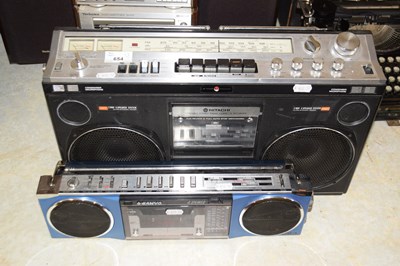 Lot 654 - A Hitachi portable stereo and a further small...