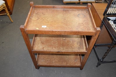 Lot 666 - An oak tea trolley