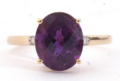 Lot 120 - Modern 9ct gold amethyst and diamond ring, the...