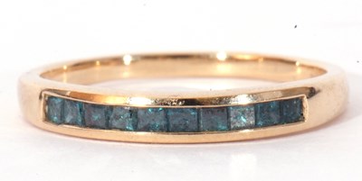 Lot 121 - Modern 9ct gold and blue stone ring, the top...