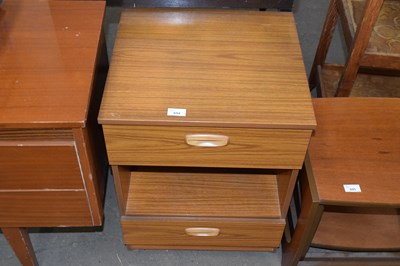 Lot 694 - A teak effect bedside cabinet
