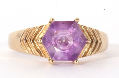 Lot 122 - Modern 9ct gold and purple crystal ring, the...