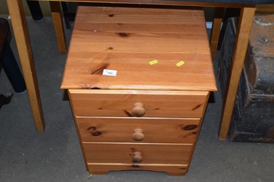 Lot 703 - A pine bedside cabinet