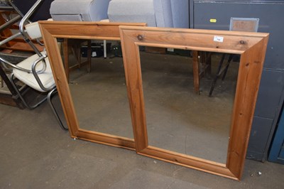 Lot 708 - A pair of pine framed mirrors