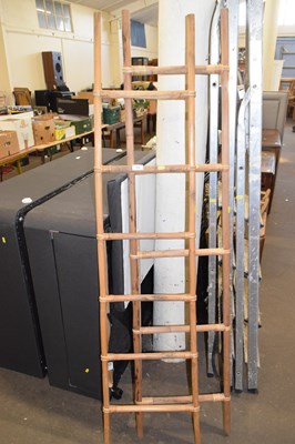 Lot 716 - Two small bamboo ladders