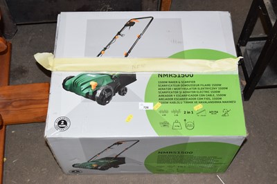 Lot 726 - A lawn raker and scarifier