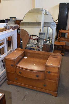 Lot 729 - An oak drop centre dressing chest