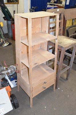 Lot 735 - A rustic pine shelf unit with two drawers to base