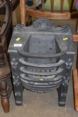 Lot 740 - A very small cast iron bedroom fireplace