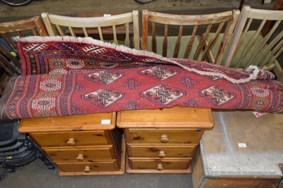 Lot 742 - A 20th Century red ground floor rug