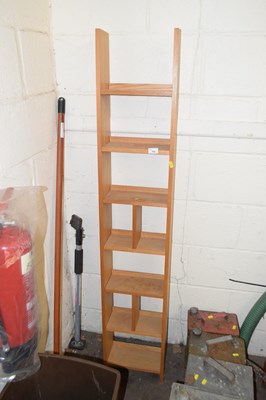 Lot 762 - An oak finish bookcase