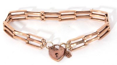 Lot 180 - 9ct marked gate bracelet, a design of...